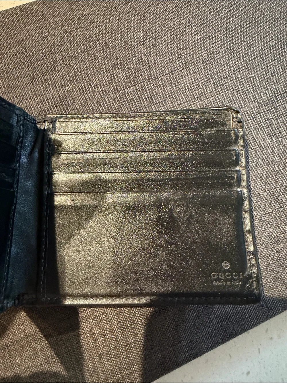 Gucci Black Perforated Embossed GG Bi-Fold Wallet